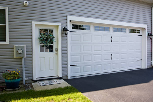 24/7 Emergency Garage Door Panel Replacement experts in Falkville, AL